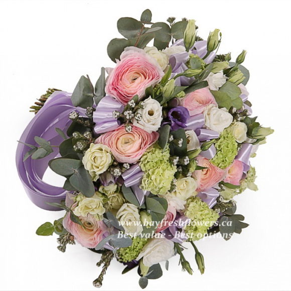 bouquet for wedding of roses, eustoma, freesia and ranunculus