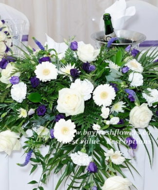Wedding flowers and centerpieces in white-blue colors