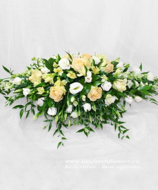 Wedding flowers and centerpieces in cream-white colors