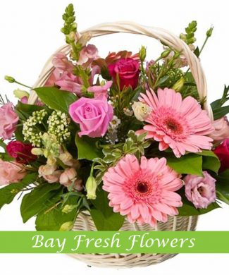 Mix of gerbers and roses in basket